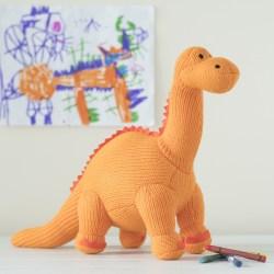 orange knitted diplodocus dinosaur toy for babies